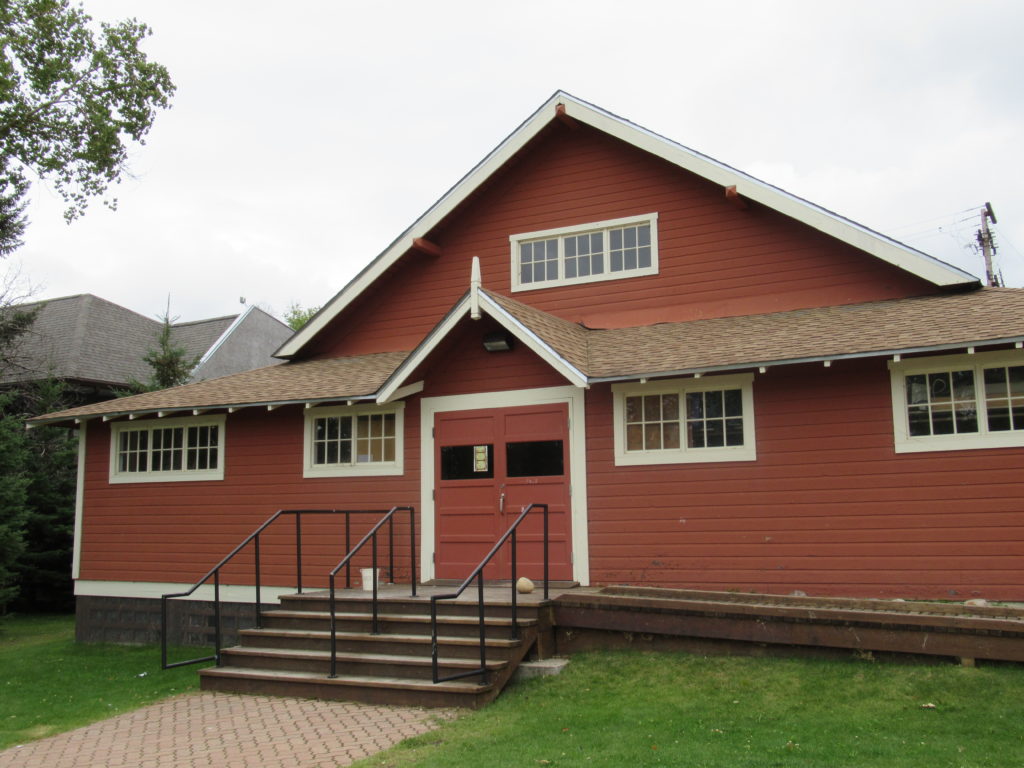 Historic rusty red-coloured building in Waskesiu