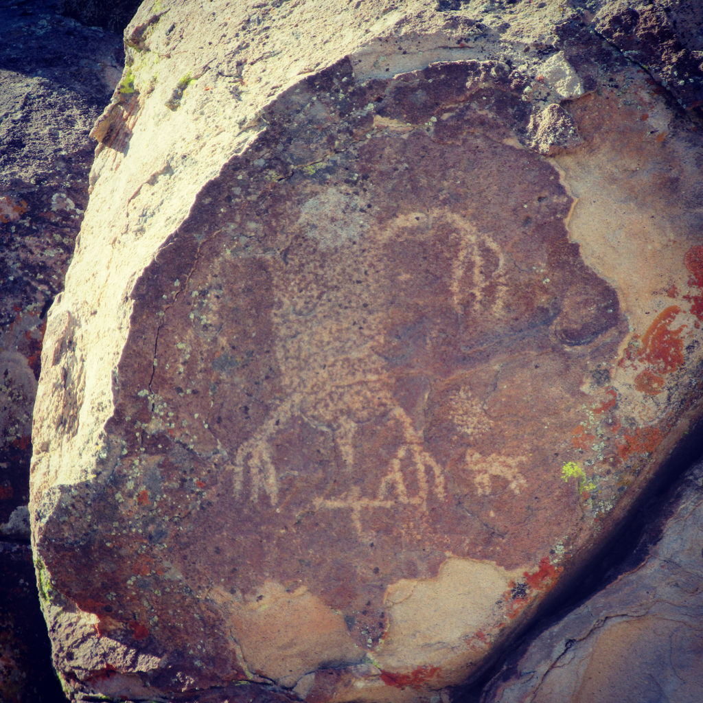 Human-like petroglyph on a large boulder
