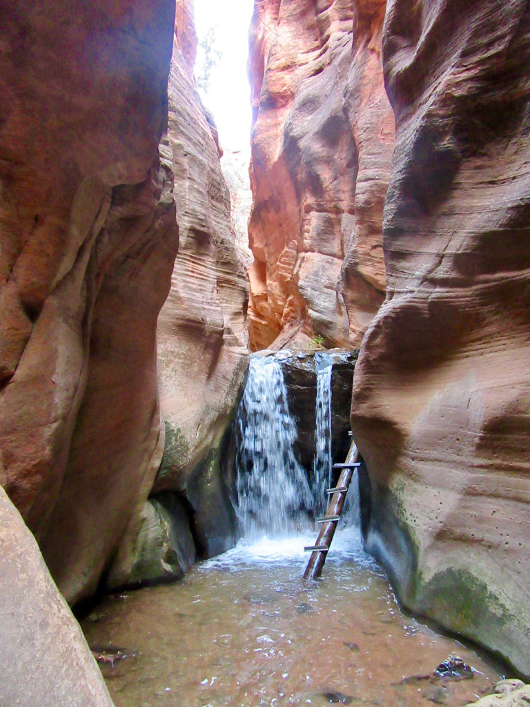 Low waterfalls in red rock canyon.