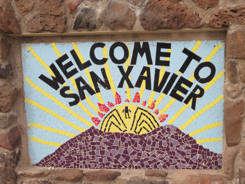 Tiled entrance sign reading: Welcome to San Javier.