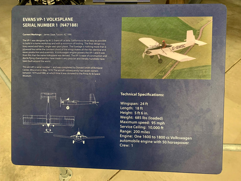 Information panel with picture of single person white plane above green fields beside text and specifications about the Evans VP-1 Volkplane.