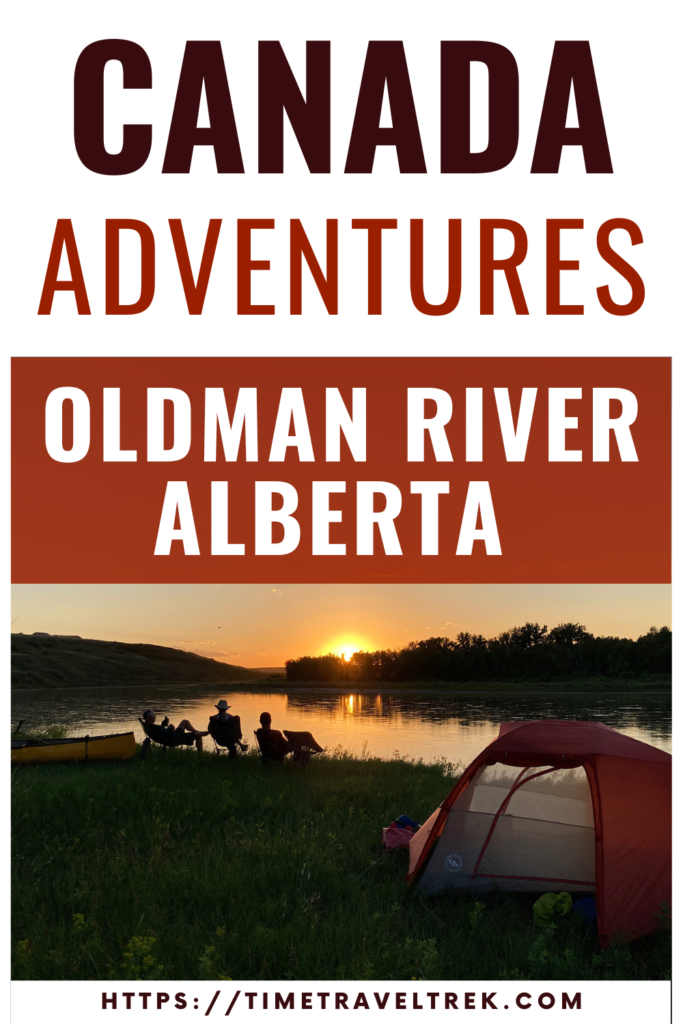 Pin image for Time.Travel.Trek. post re: Canada Adventures Oldman River Alberta. Photo of tent in foreground, 3 silhouettes of people sitting on chairs in front of river with sun setting.