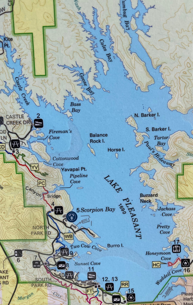 Map of Lake Pleasant with numerous named bays and island and campground and picnic symbols.