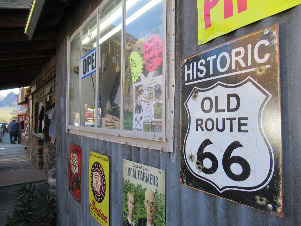Tin signs on metal clad building with main sign reading: Historic Old Route 66.