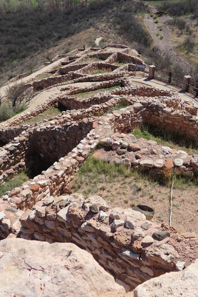 Overlooking stone walls running down a hillside.