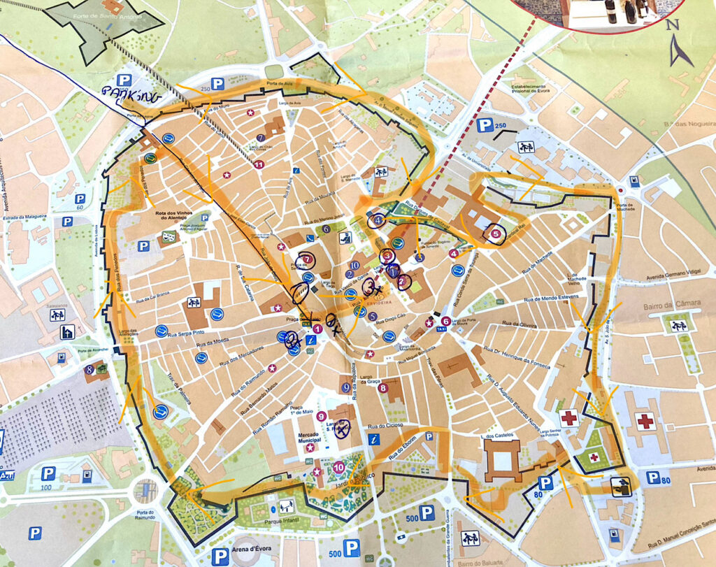 Map of a small town with a route outlined in yellow around outer perimeter. 