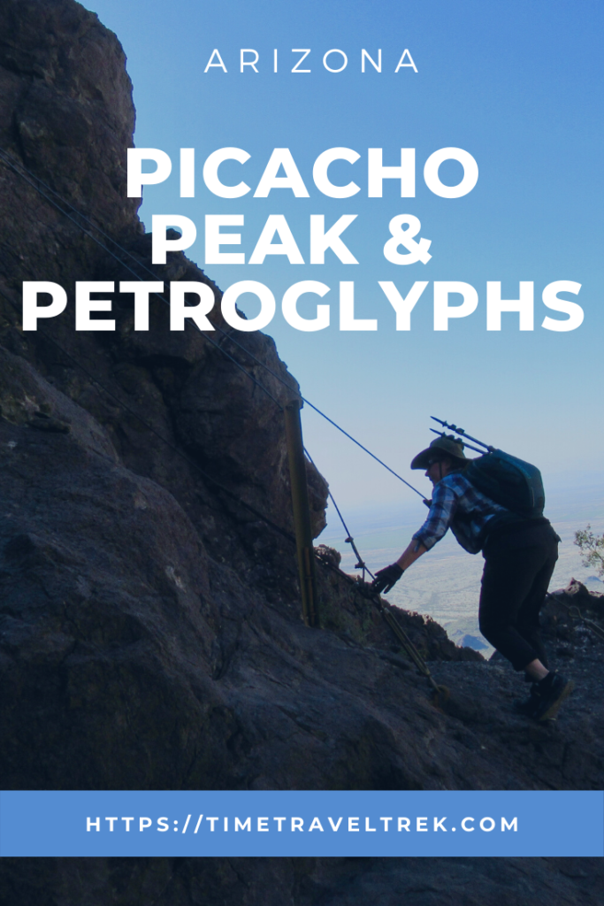 Image of woman with backpack approaching cables on rock face. Text overlaid reads: Arizona - Picacho Peak & Petroglyphs. At bottom of image the web address is https://timetraveltrek.com 