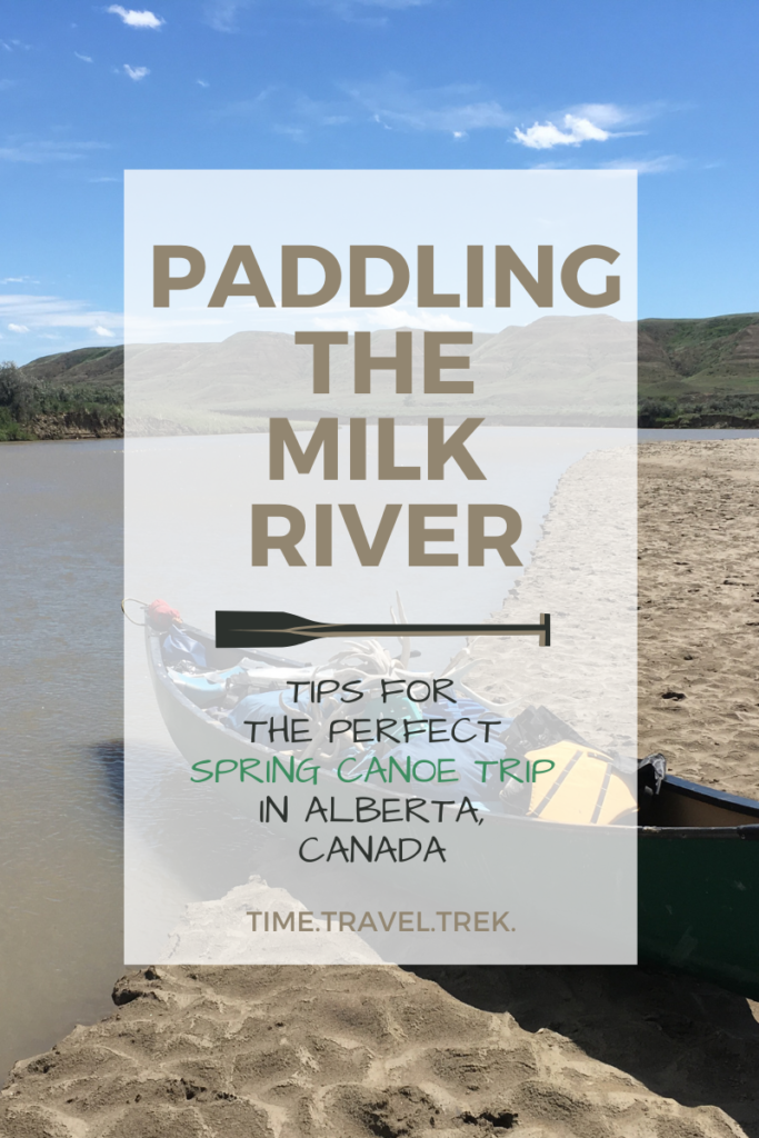 Pin image for Paddling the Milk River (tips for the perfect spring canoe trip in Alberta, Canada) blogpost from Time.Travel.Trek.