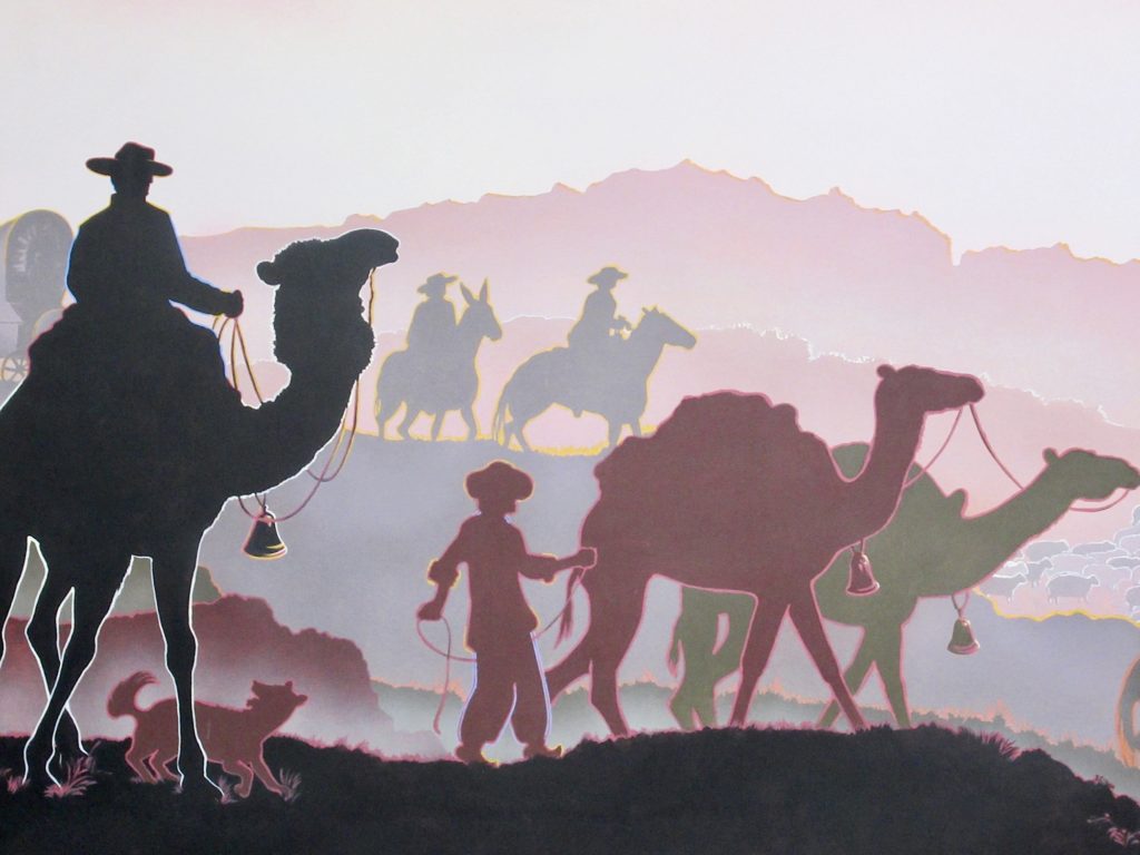 Painting in pink, purple, grey and black with silhouettes of camels, people, dogs and horseback riders.