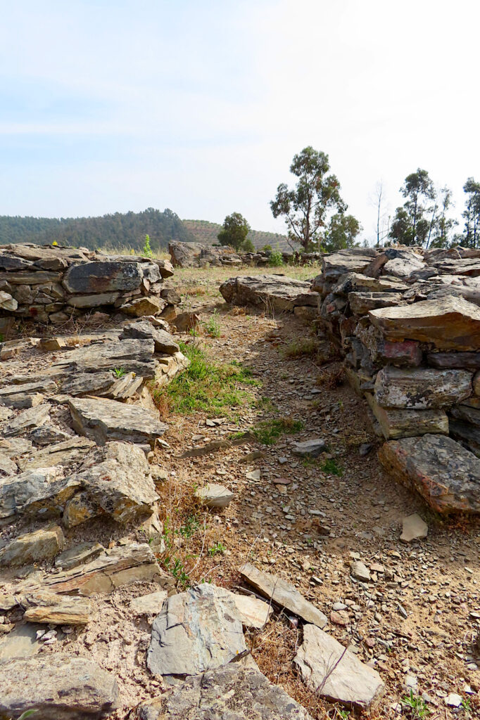 Stacks of stones around pathway.