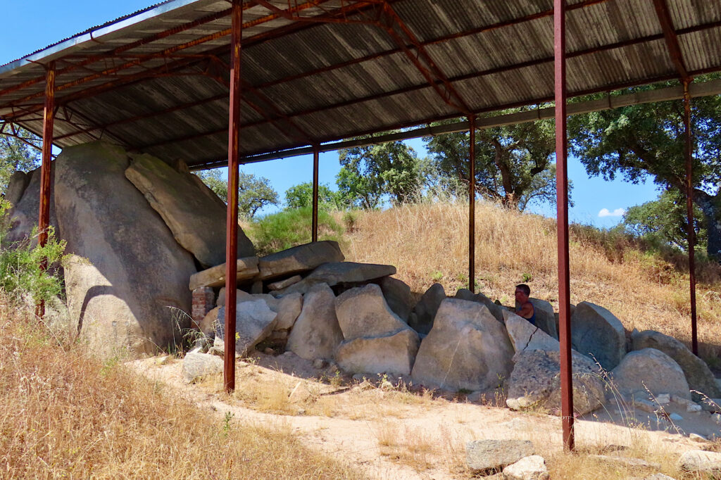 Large stones in ro under metal roof.