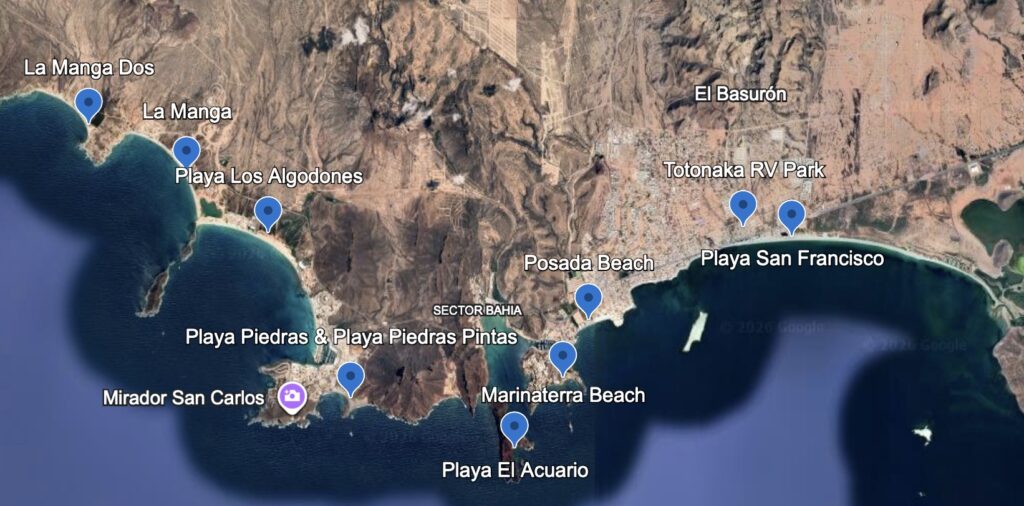 Aerial photo of land and sea with blue pins labelling beach locations.
