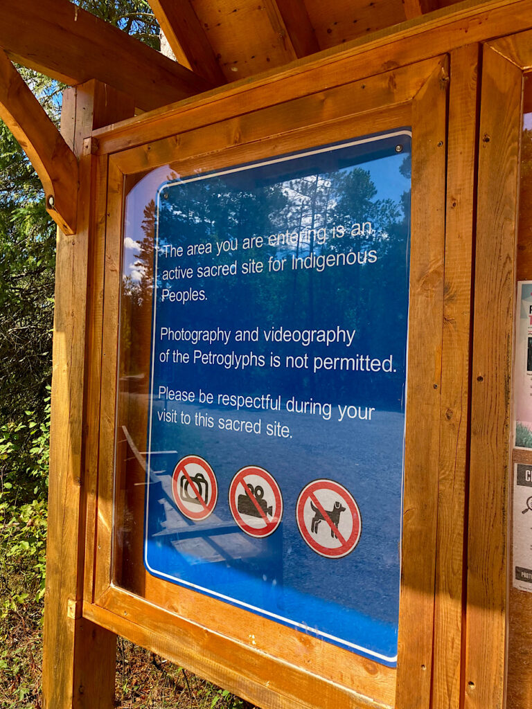 Information sign with symbols no photos, no video, no pets.